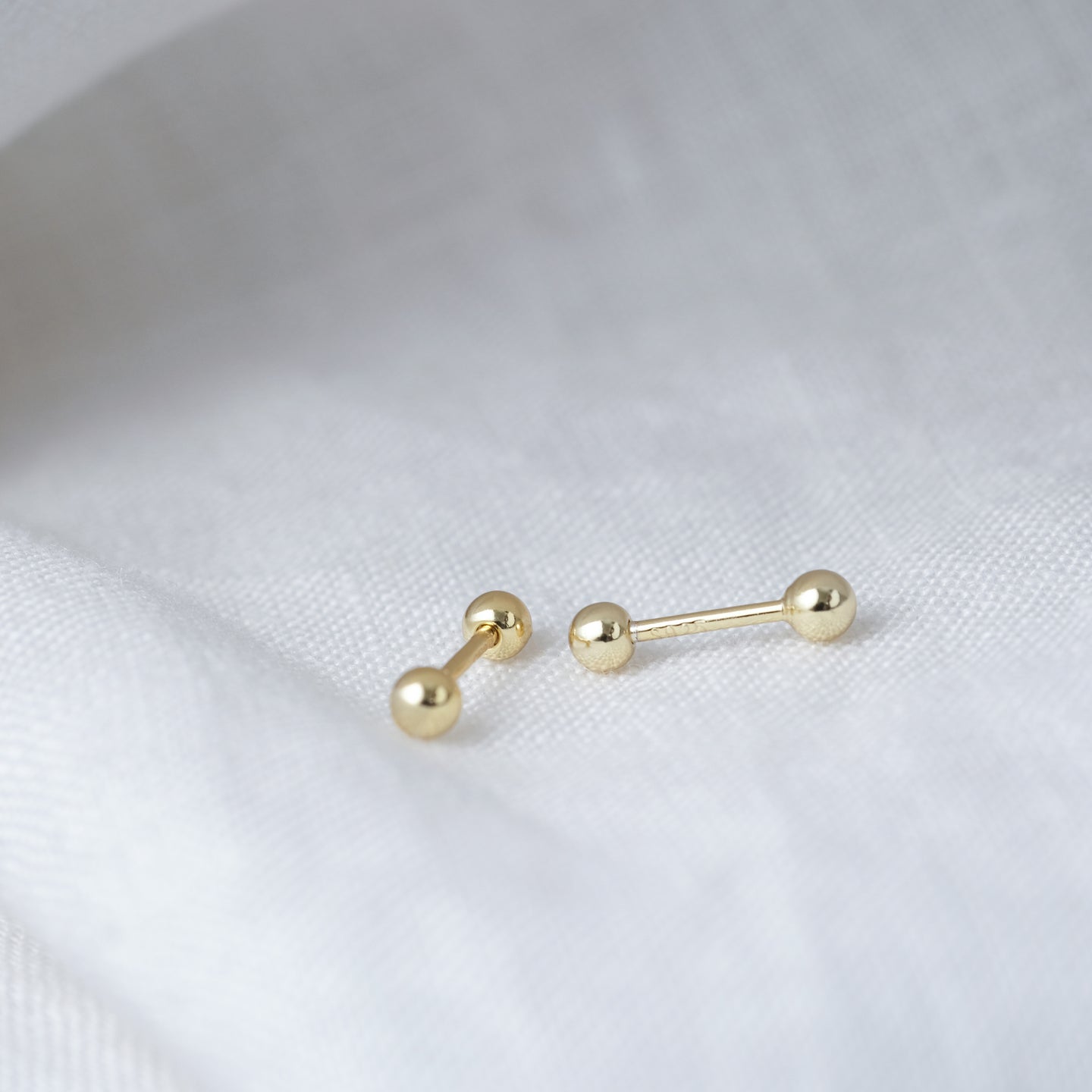 files/hola-teeny-tiny-stud-earrings-18k-gold-vermeil-1.jpg