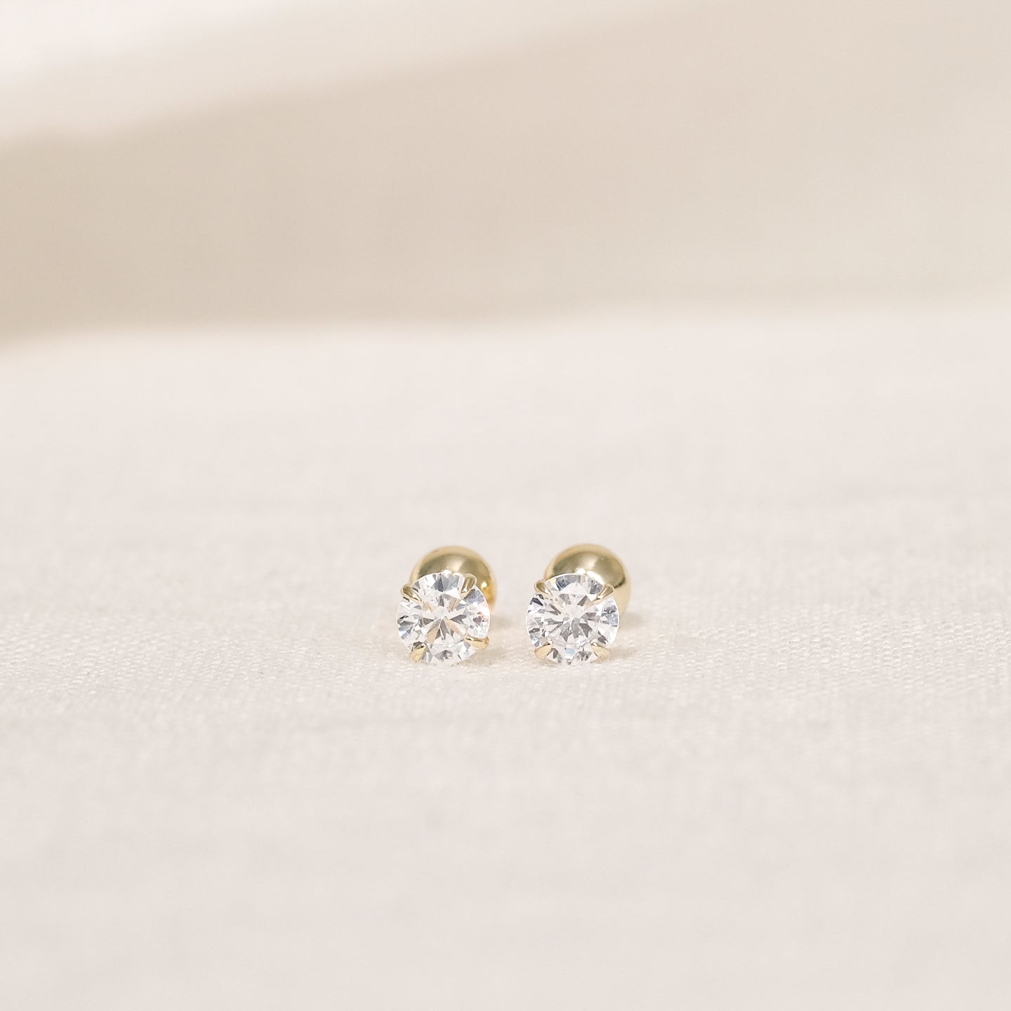 files/sadi-tiny-18k-gold-vermeil-cz-studs-2_dd521c31-f5aa-4d93-9496-325bec809e72.jpg