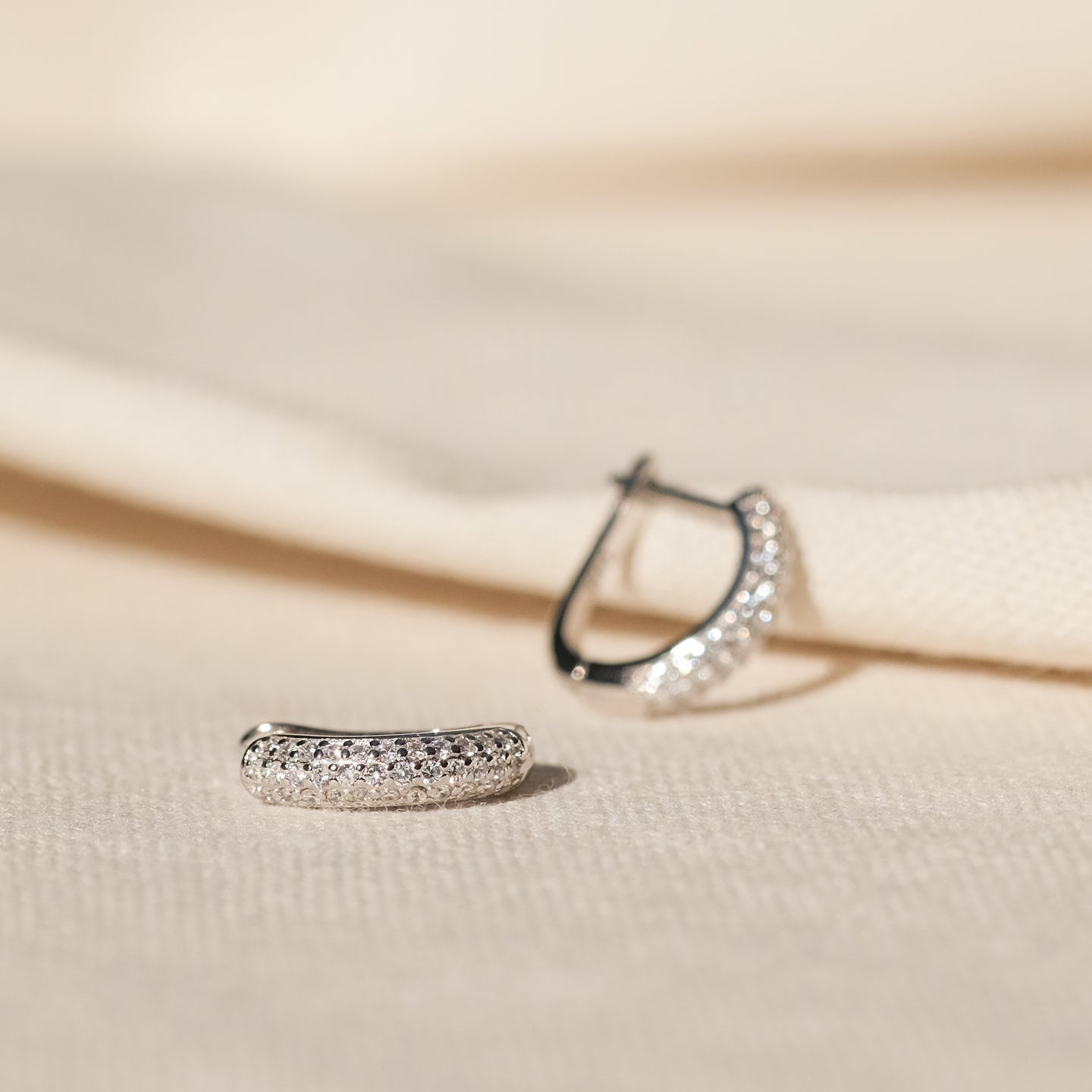 products/anna-925-sterling-silver-cz-hoops-1.jpg