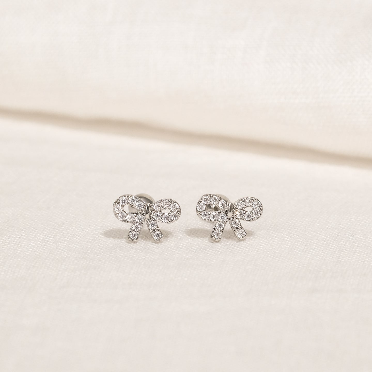 products/delin-cz-stud-earrings-18k-gold-stainless-steel-1.jpg
