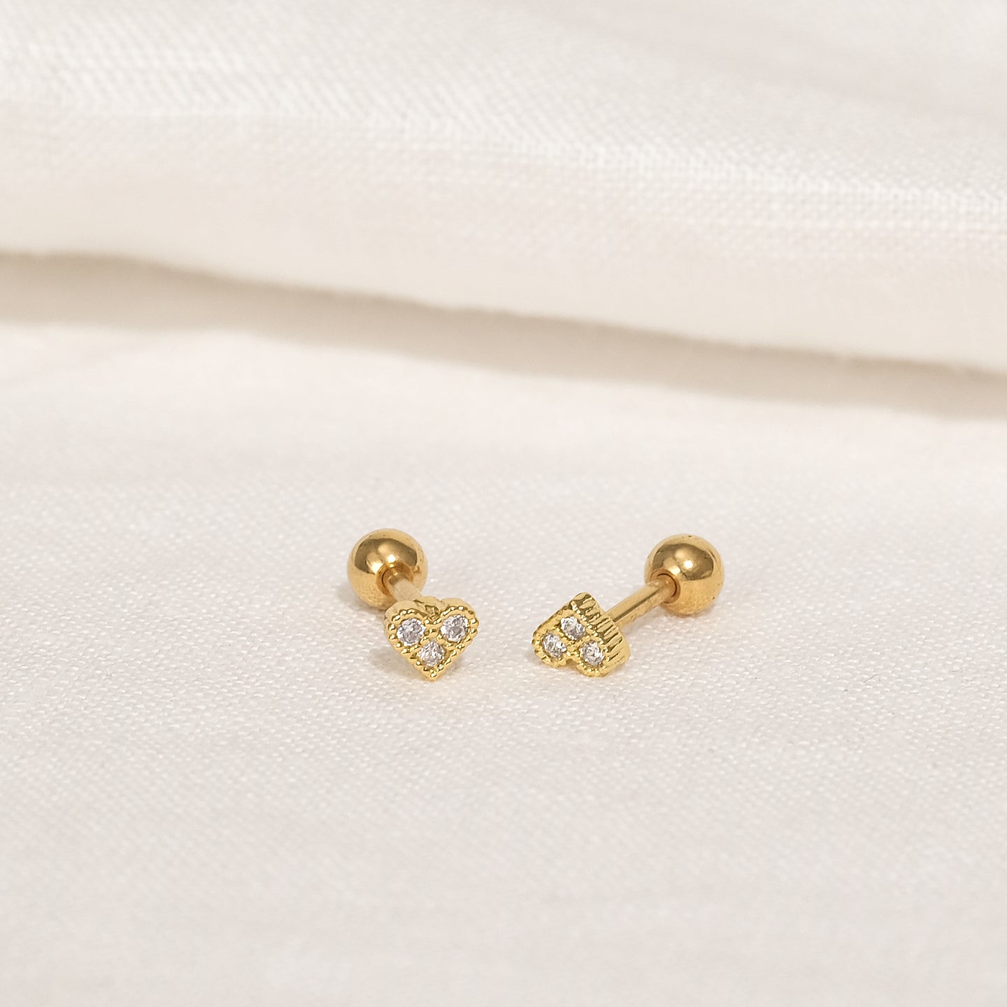products/hani-cz-stud-earrings-18k-gold-stainless-steel-1.jpg