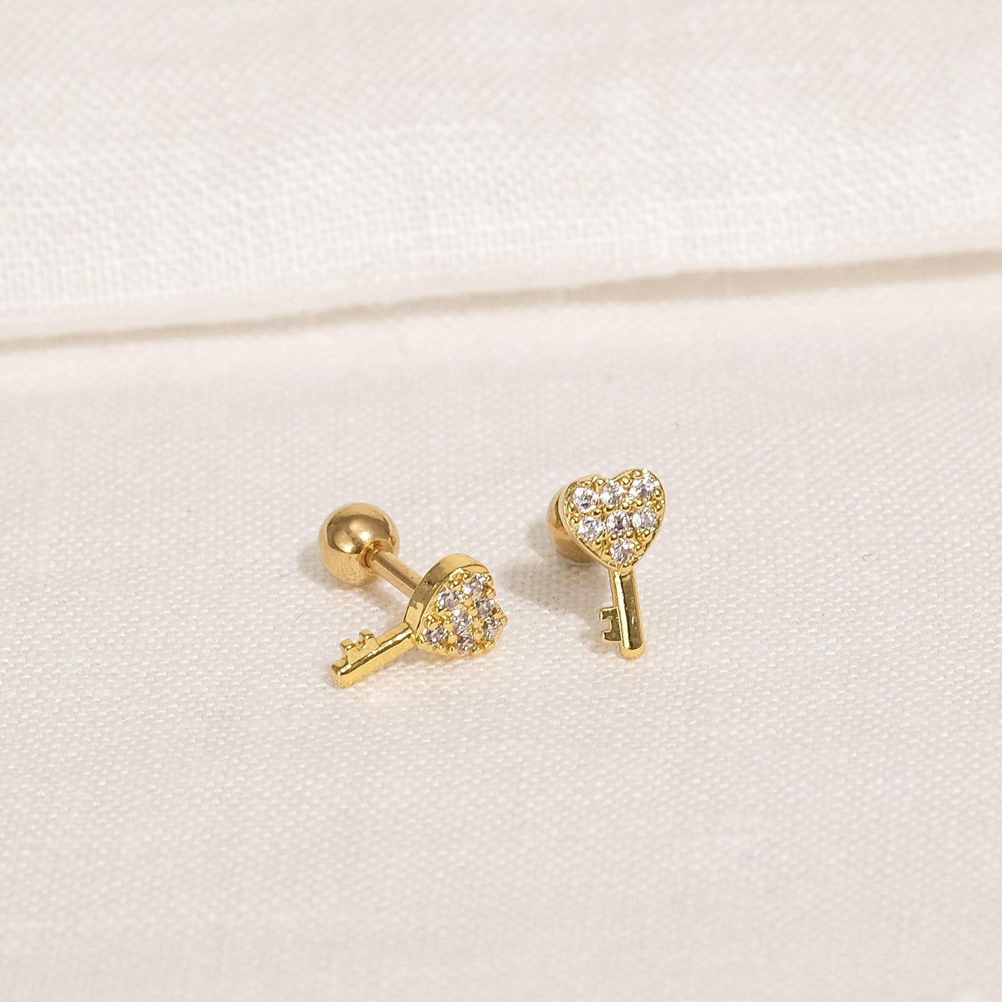 products/kaleb-cz-stud-earrings-18k-gold-stainless-steel-1.jpg