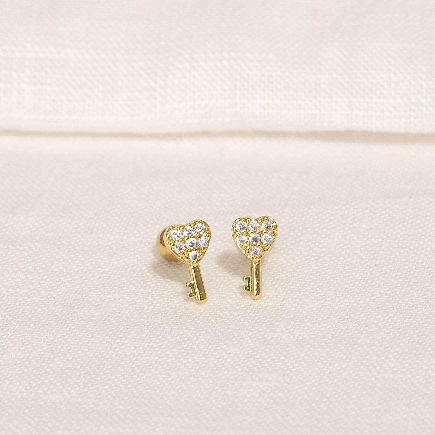 products/kaleb-cz-stud-earrings-18k-gold-stainless-steel-2.jpg