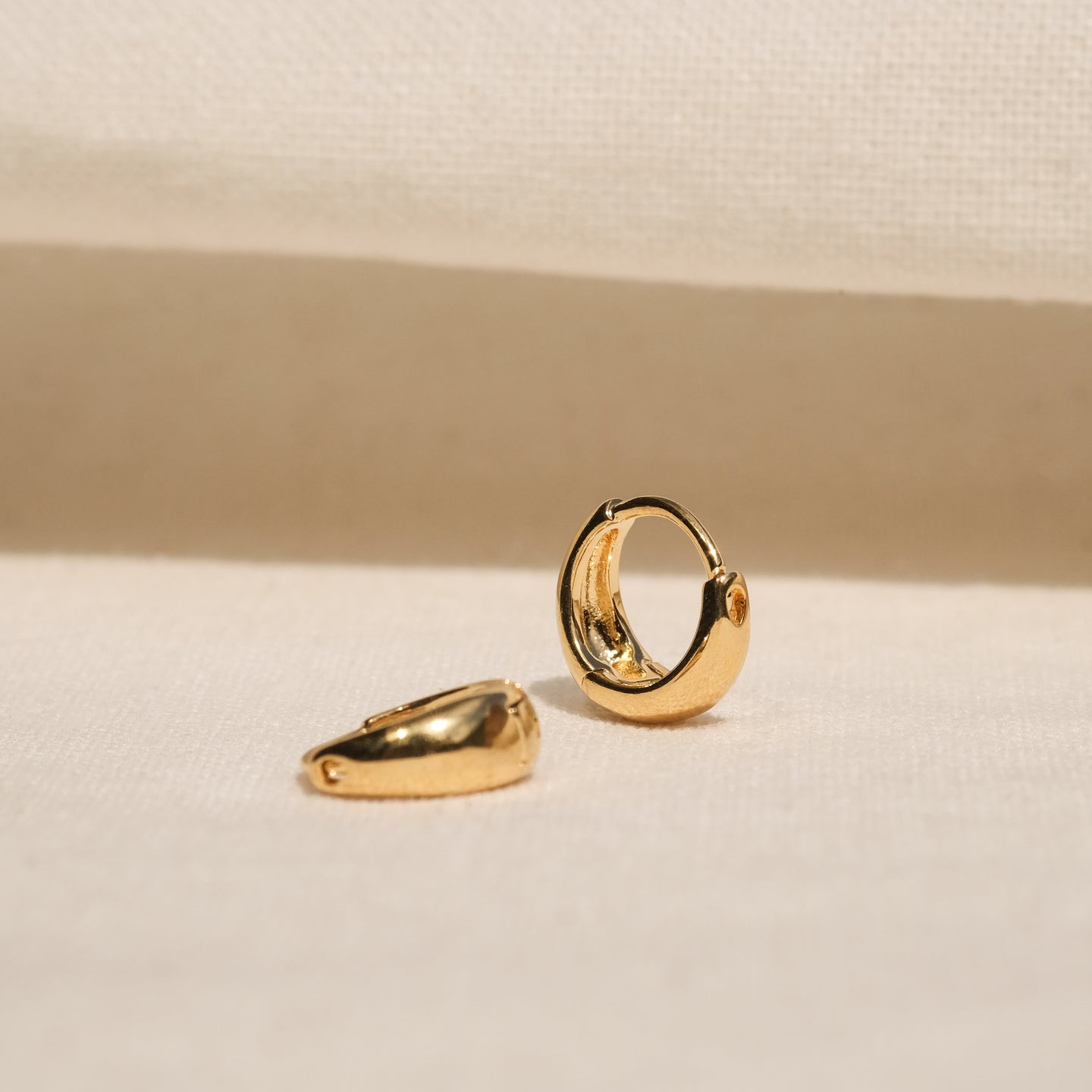 products/luri-teeny-tiny-hoops-gold-1.jpg