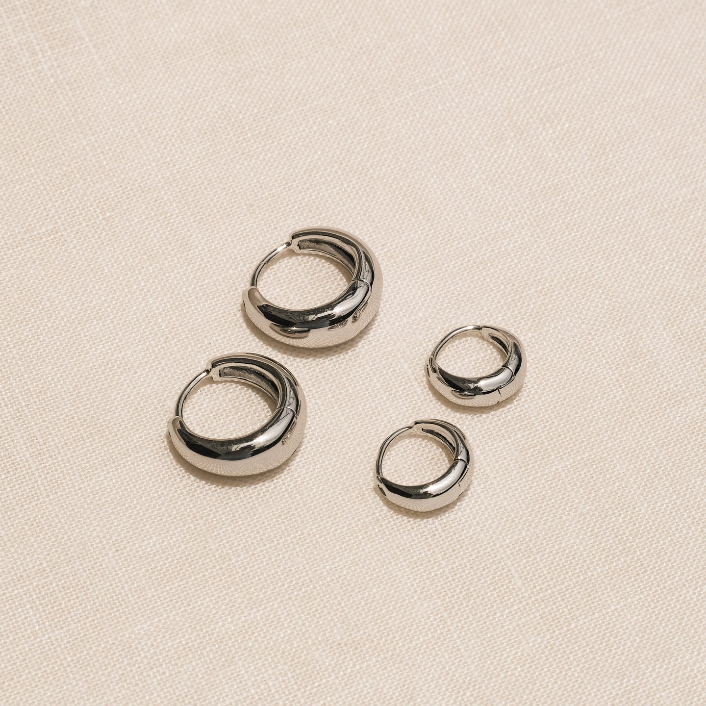 products/luri-teeny-tiny-hoops-silver-2.jpg