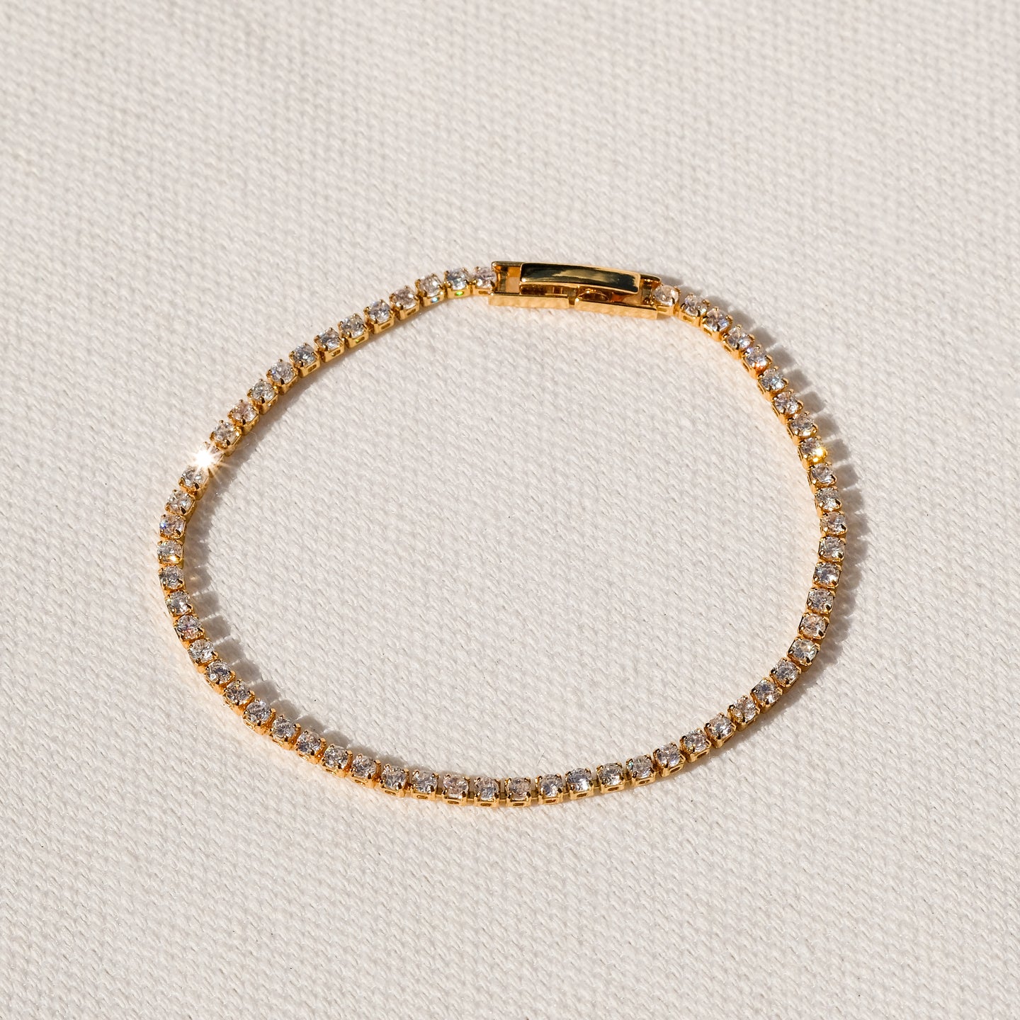 products/tenisia-cz-bracelet-18k-gold-brass-2.jpg