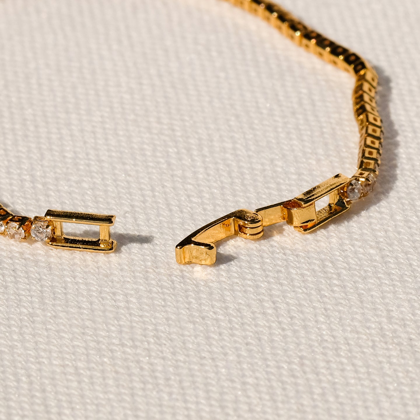 products/tenisia-cz-bracelet-18k-gold-brass-3.jpg